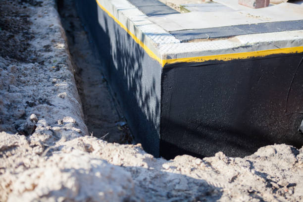 Professional Waterproofing technician working in Wisconsin Dells, WI